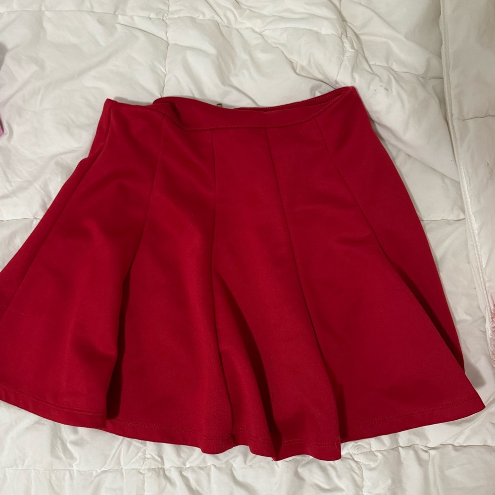 Red pleated skirt